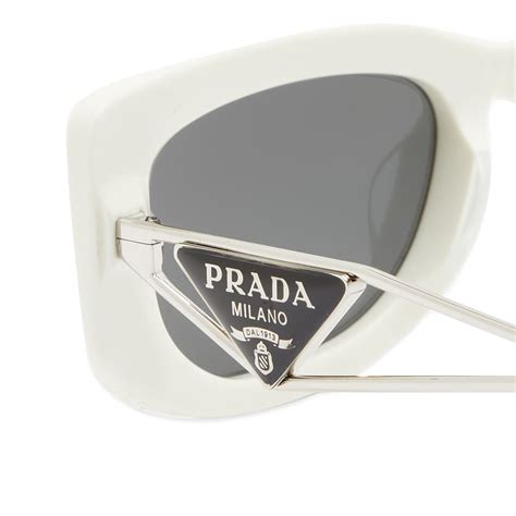 prada white glasses frames|Prada sunglasses with white sides.